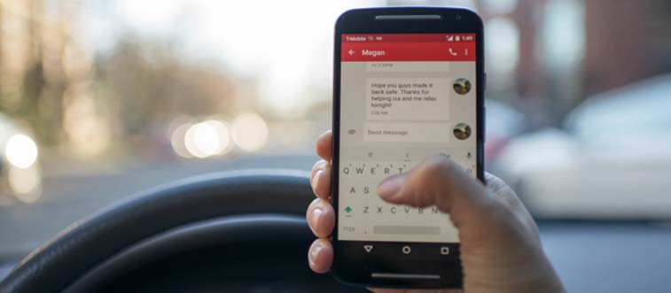 mobile phone in hand whilst at the wheel